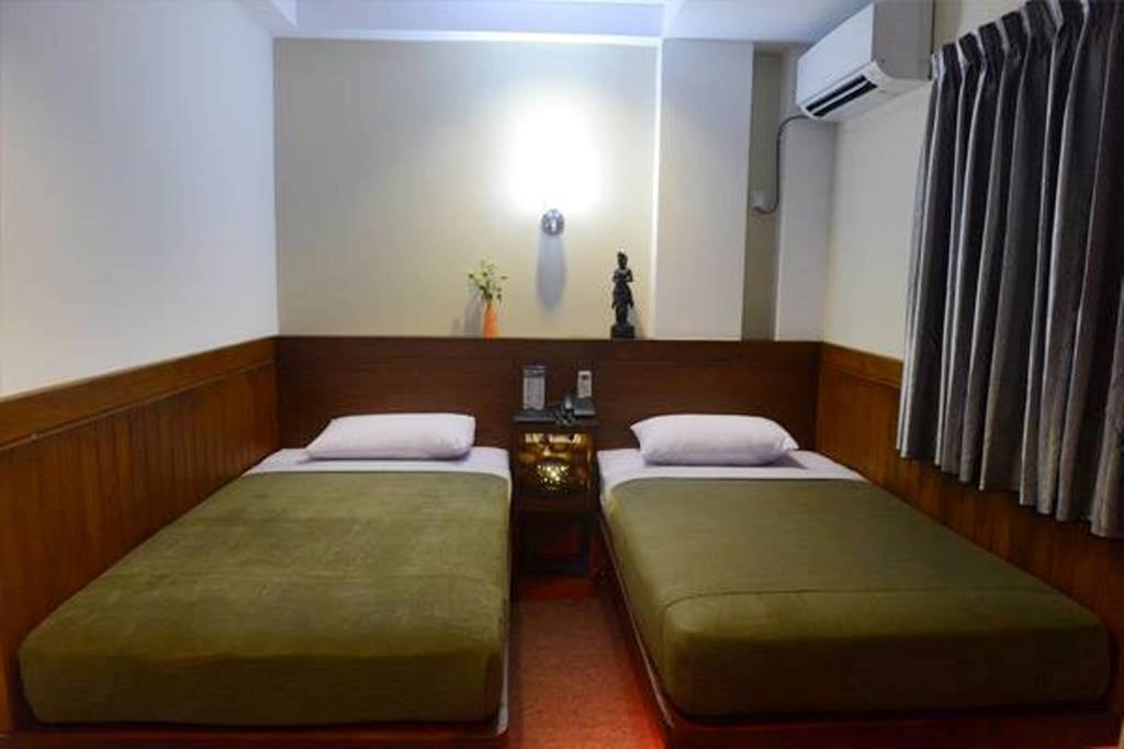 Green Paradise Hotel Γιανγκόν Δωμάτιο φωτογραφία